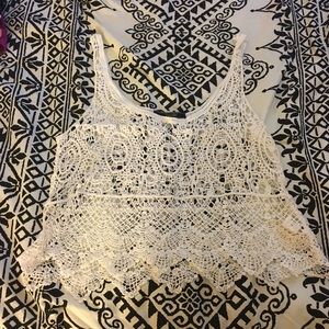Lace patterned tank top.