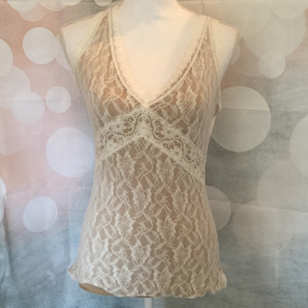 Cream colored lace detailed form fitting top