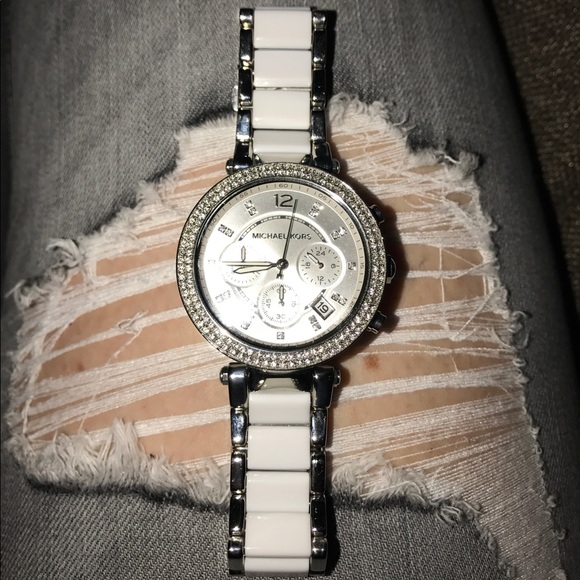 White and silver MK watch