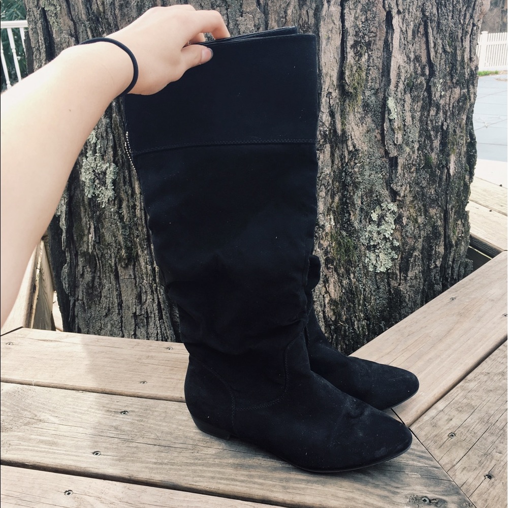 Tall black boots