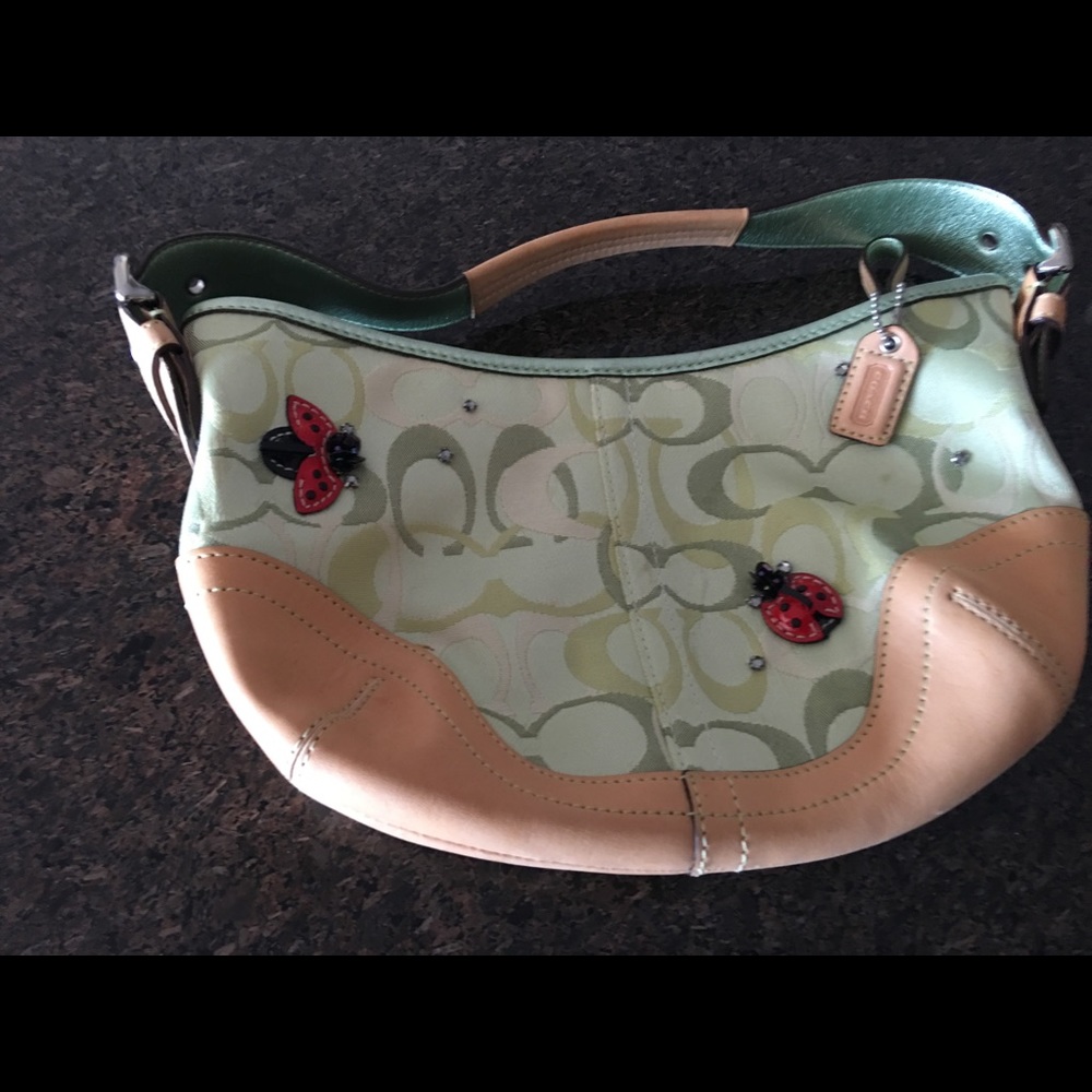 Spring Coach bag w/ register number