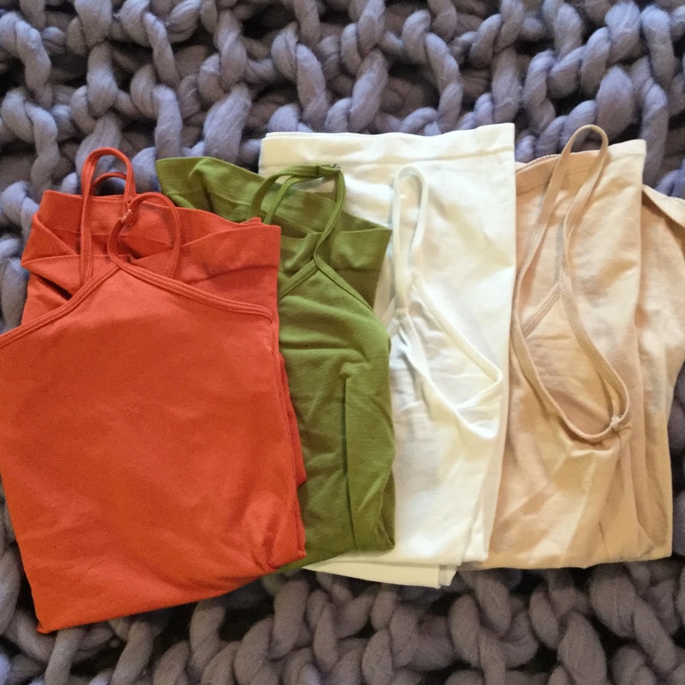 Lot of 4 form fitting spaghetti strap tanks