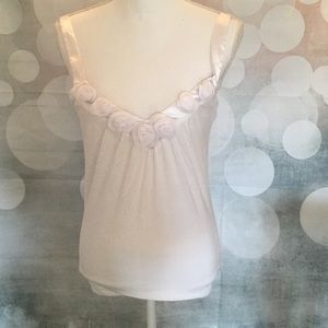 Beautiful BEBE white tank with floral accents