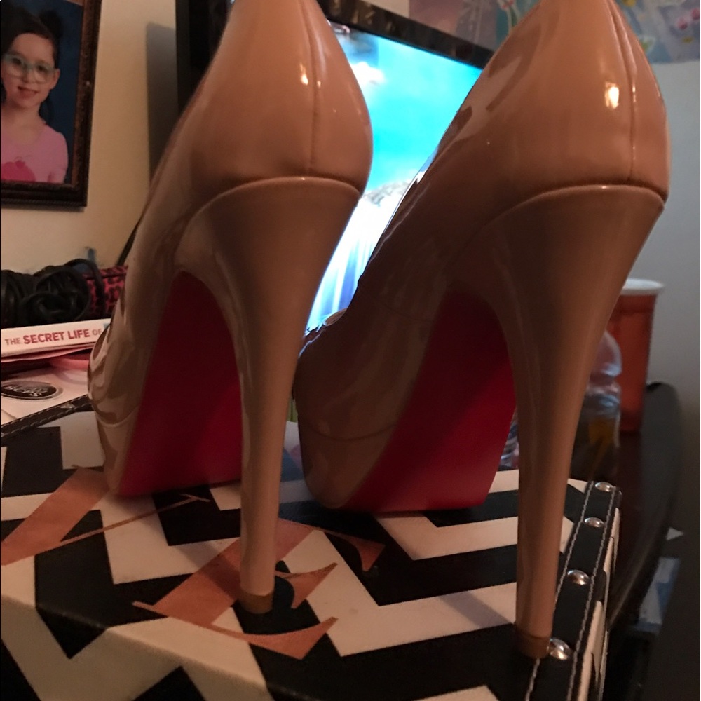 Christian Louboutin Nude Peep toe heel