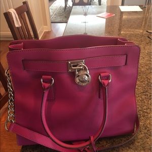 Michael Kors pink purse.