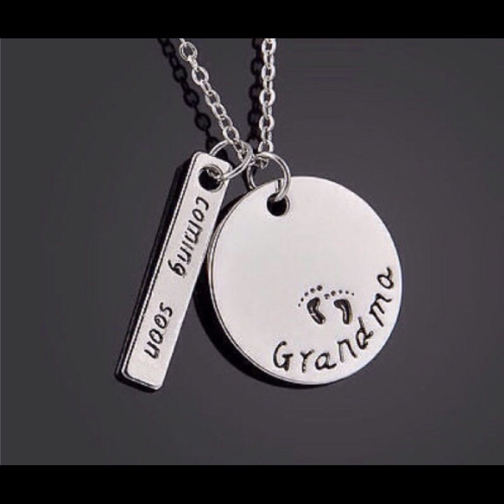 Grandma's surprise silver pendant upcoming birth.