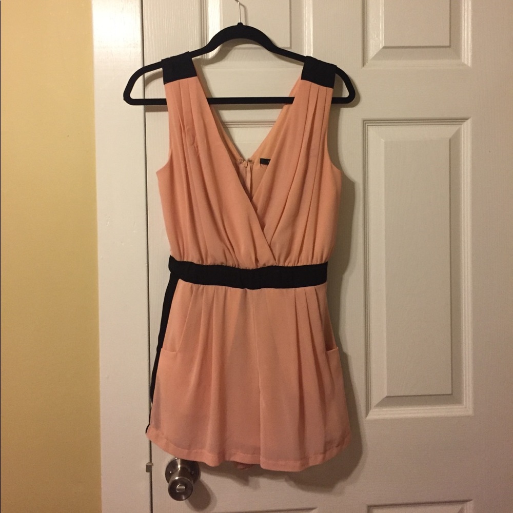 Pink and black romper