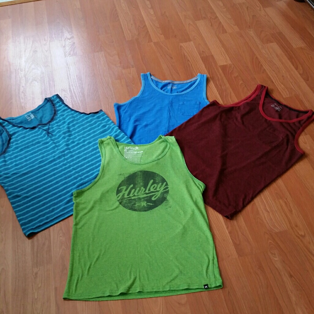 4 total - 1 Hurley,  3 INC tanks young mens