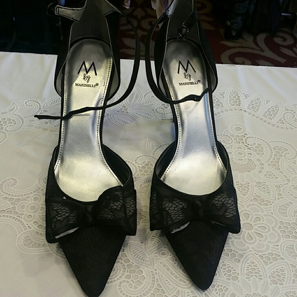 Beautiful black lace  heels with bow. Size 9.5