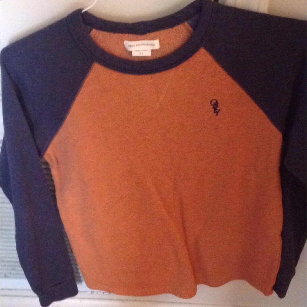Navy and burnt orange sweat shirt.