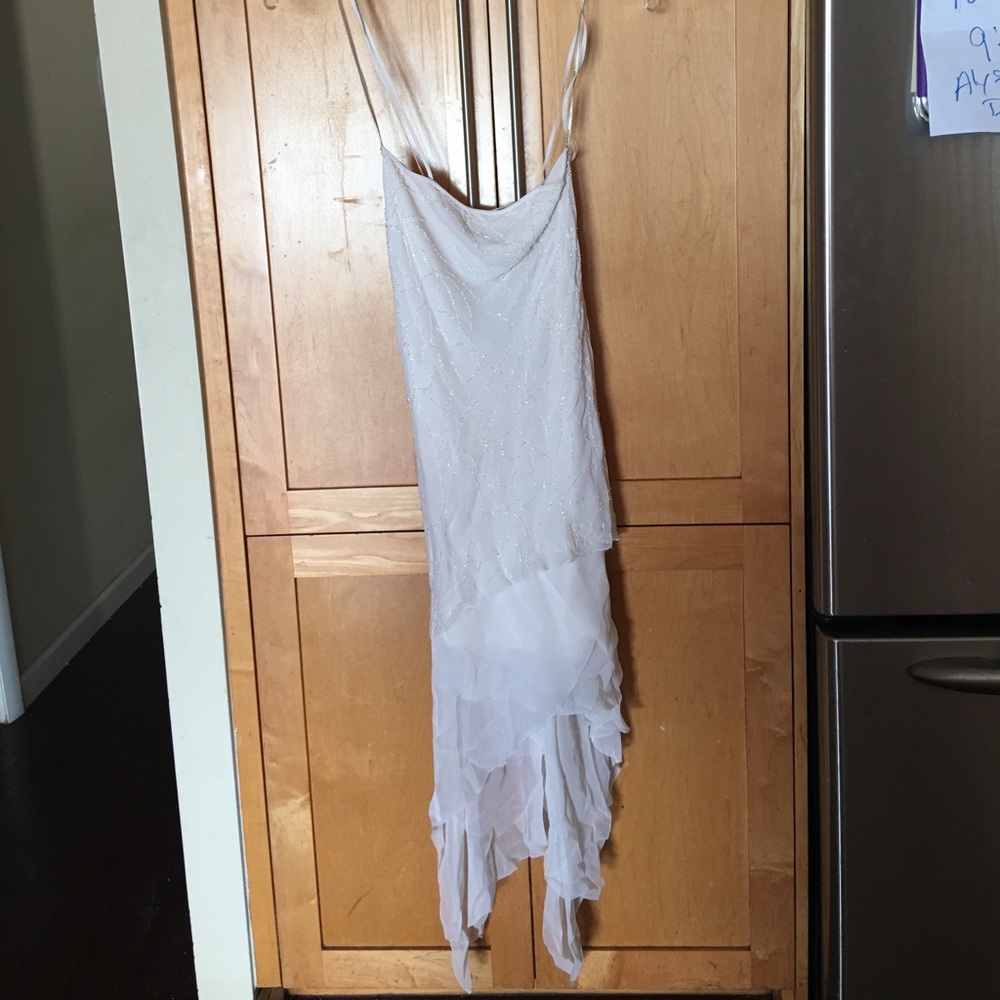 This is a new Bcbg elegant white / wedding dress