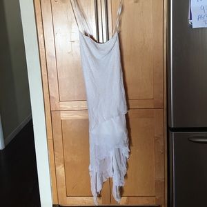 This is a new Bcbg elegant white / wedding dress