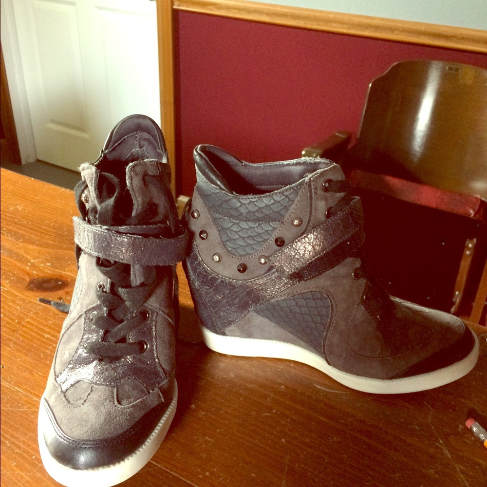 Guess hidden heel sneakers.