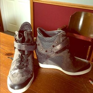 Guess hidden heel sneakers.