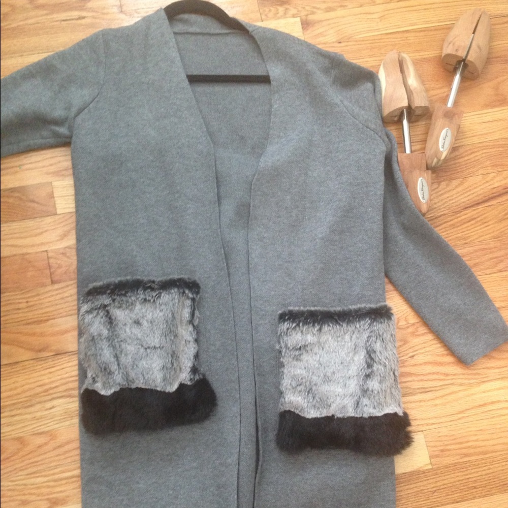 Grey knit cardigan with fur pockets