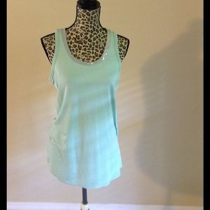 Mint green tank top, with silver sequin detail.