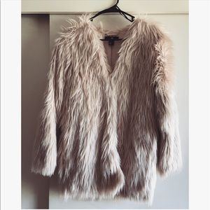 Baby pink faux fur coat
