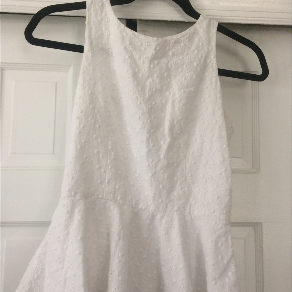 White eyelet peplum top