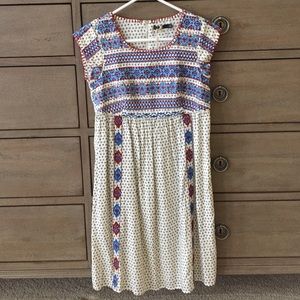 Red, blue, and cream embroidered dress