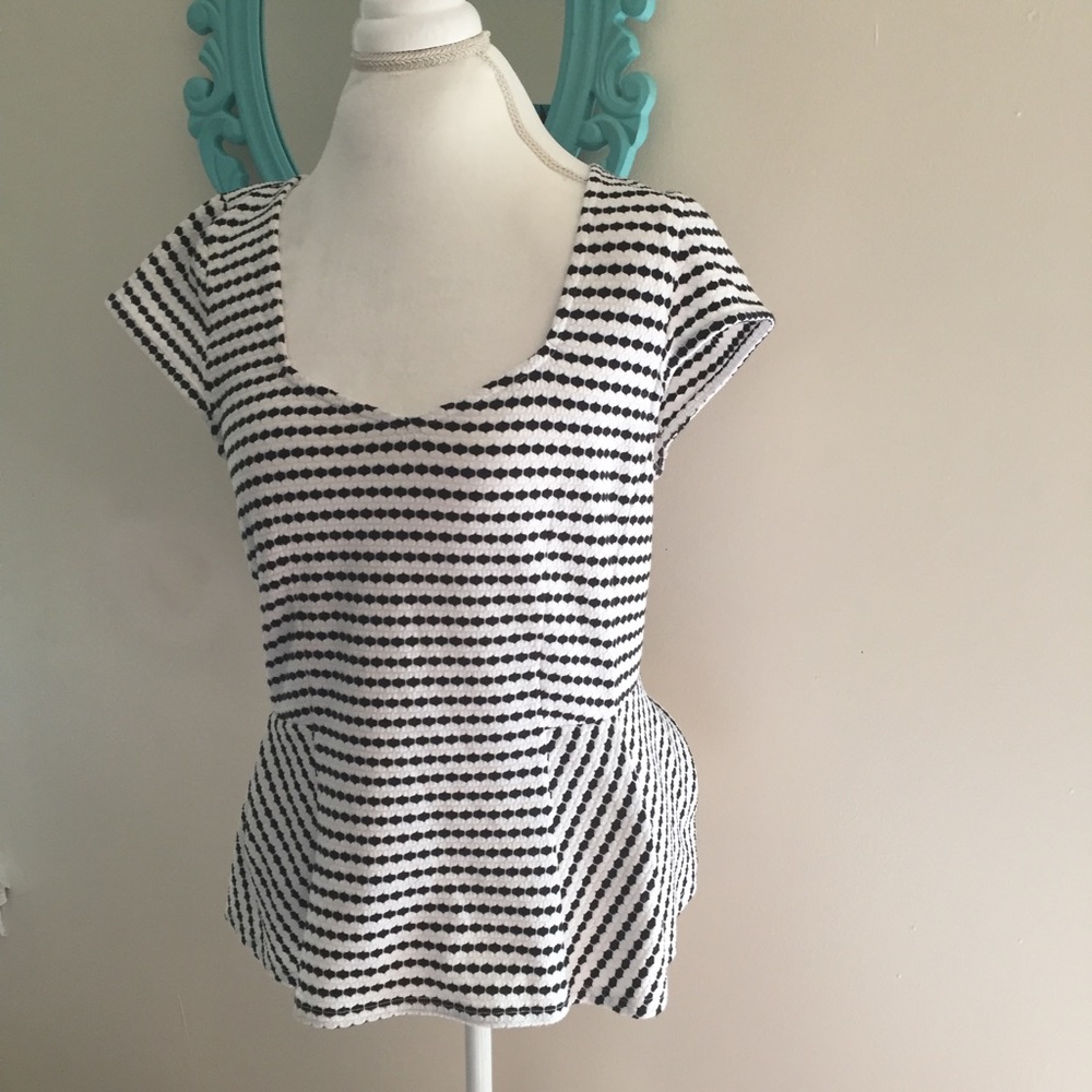 Anthropologie black and white peplum top