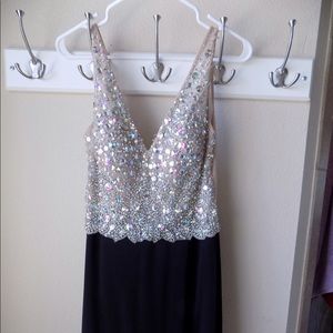 Long black and silver v neck prom dress