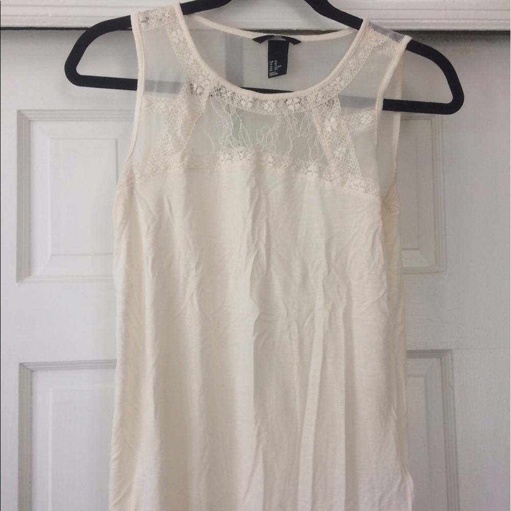 Cream sleeveless top