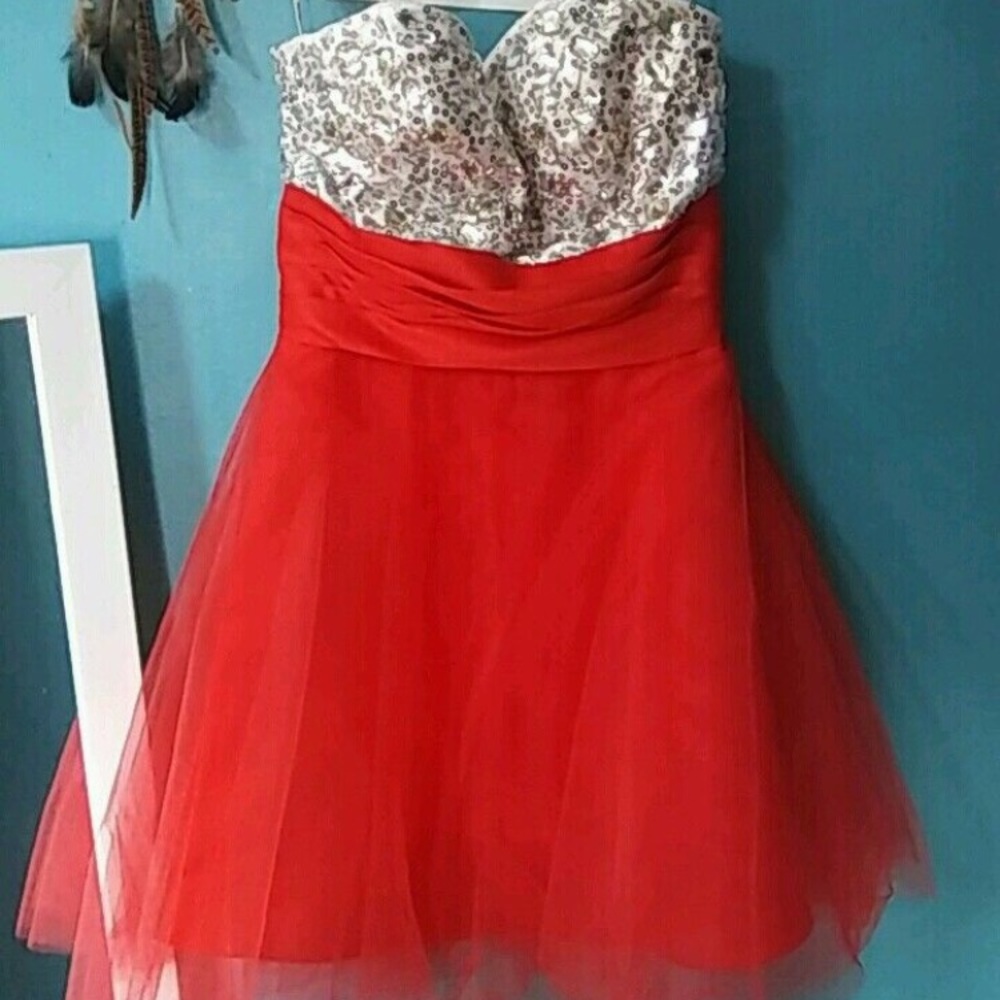 Silver sequin with red poof bottom prom dress