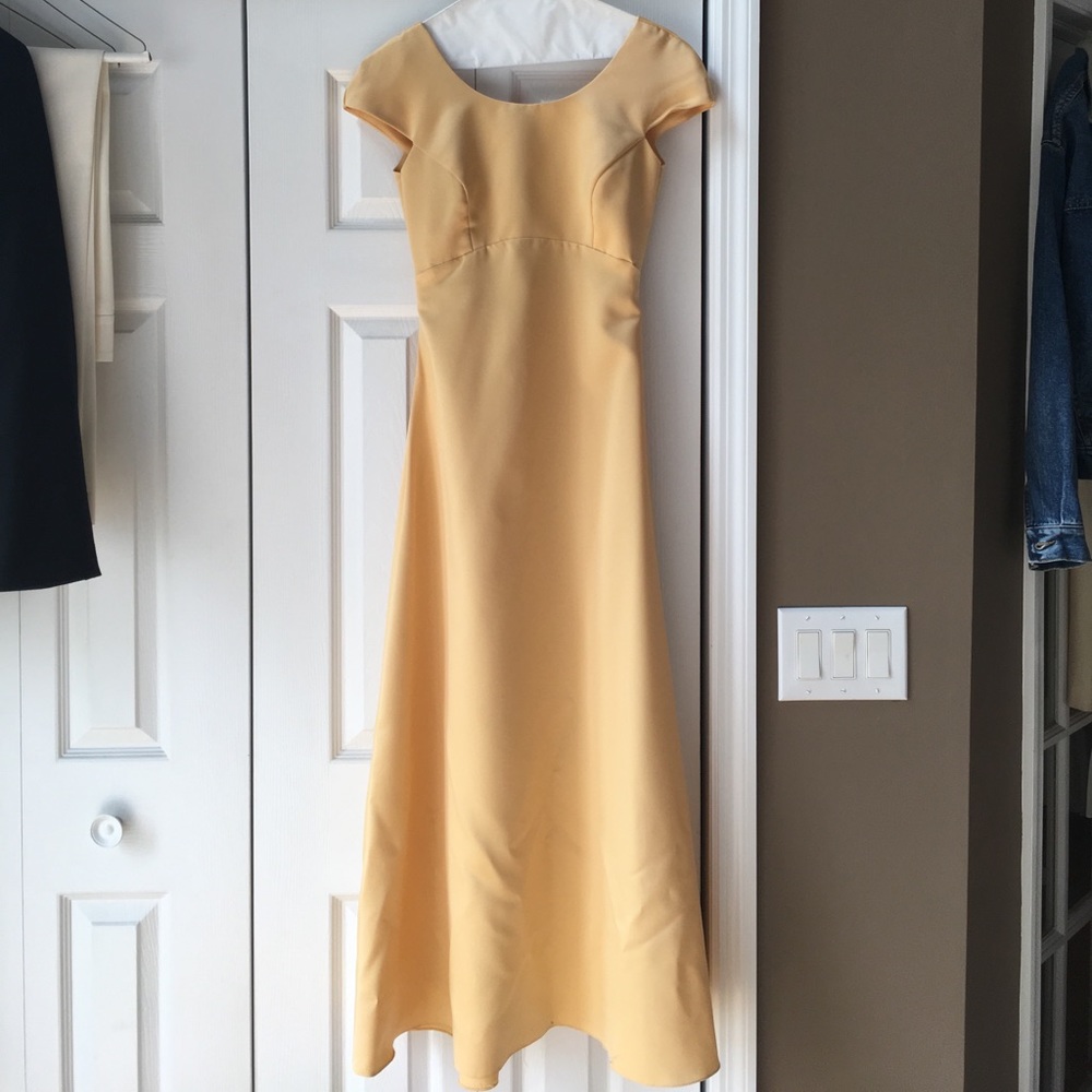 Cap-sleeved dress worn in a wedding
