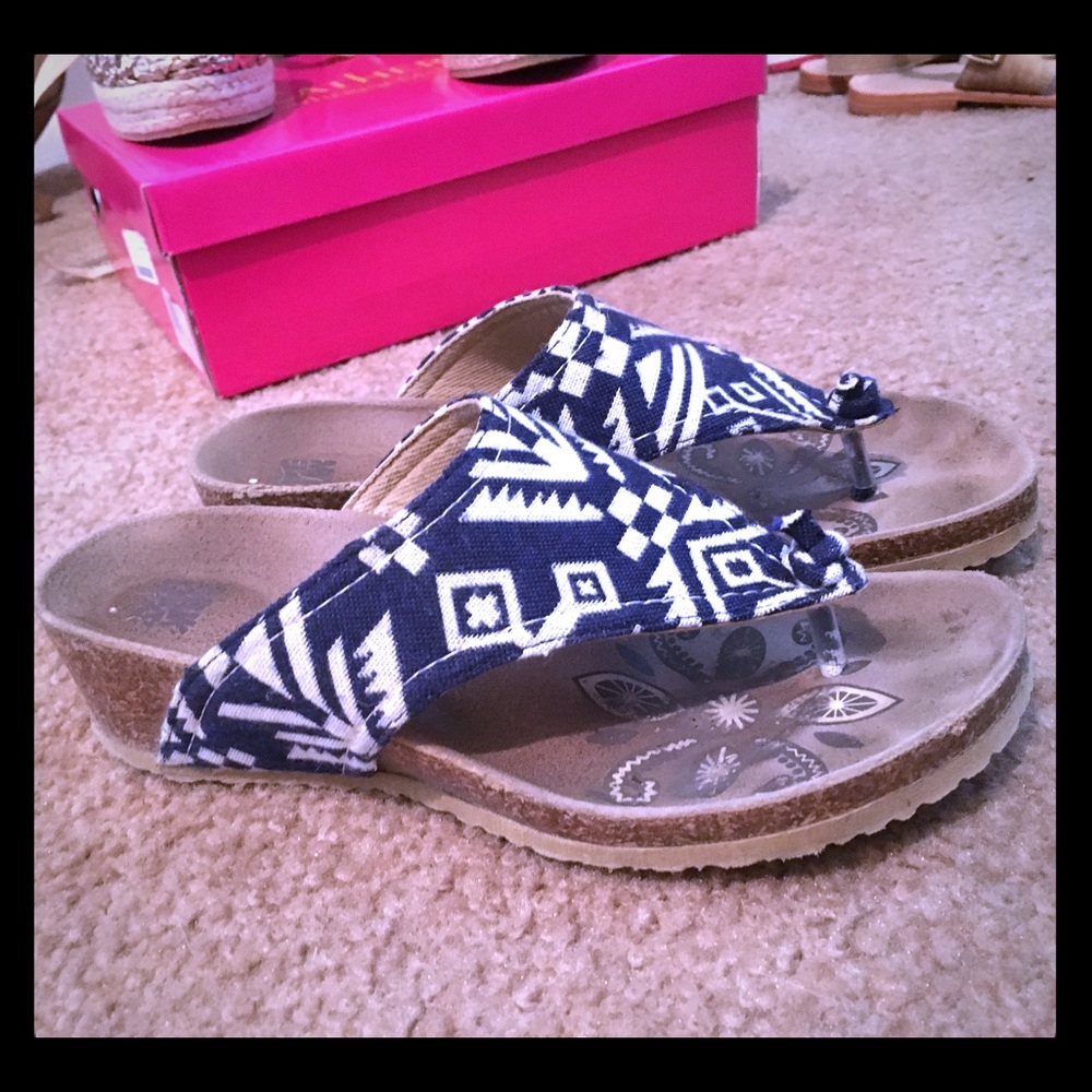 SOLD. Navy Aztec Wedge flip flops