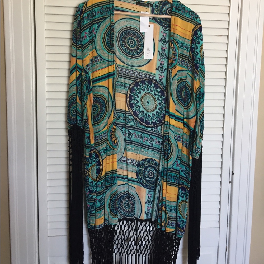 Boho inspired kimono with crochet/fringe detail