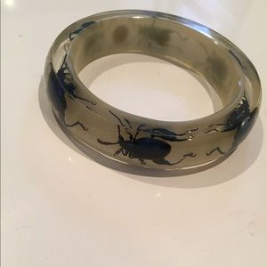 Tory Burch clear plastic bangle with beetles