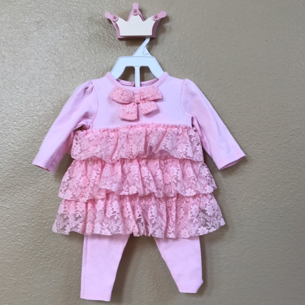 Pink top and pant outfit with lace detail.