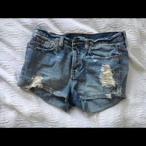 Distressed denim shorts