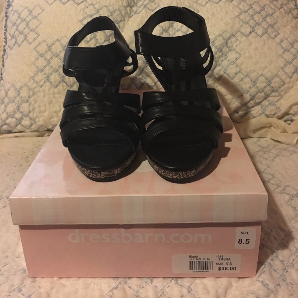 Black and snake print wedges.