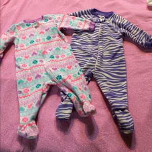 2 pairs of footie pjs