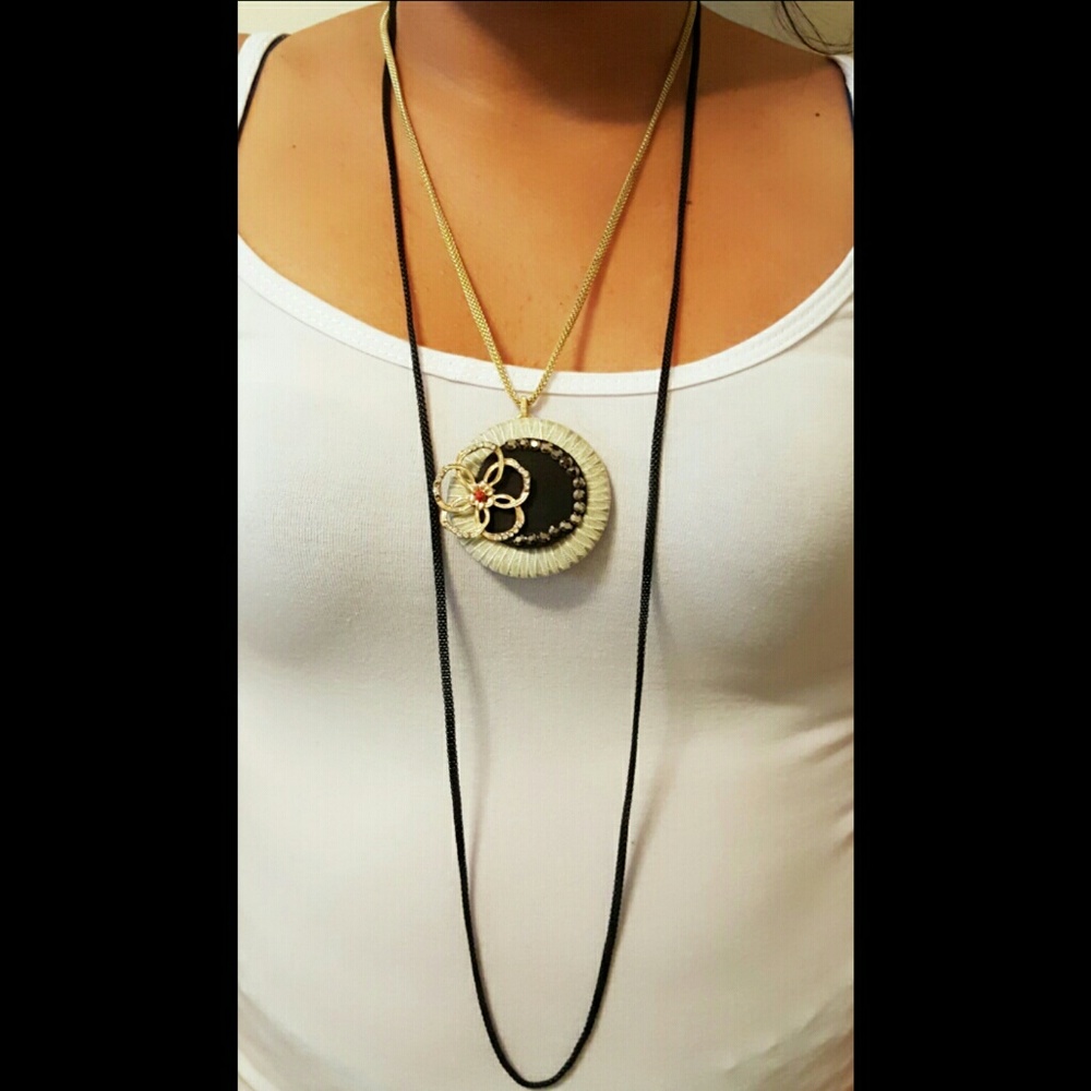 Brand new set of long necklace and earrings