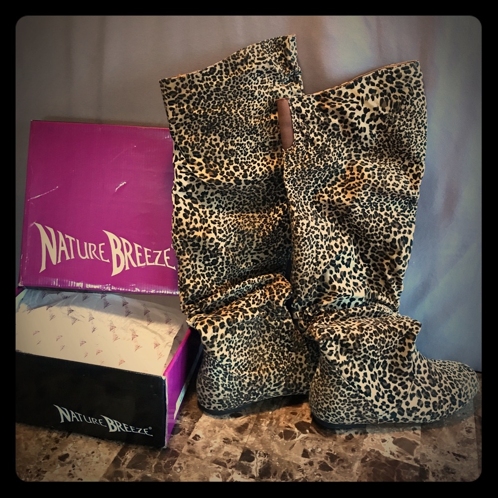 Over the knee cheetah boots