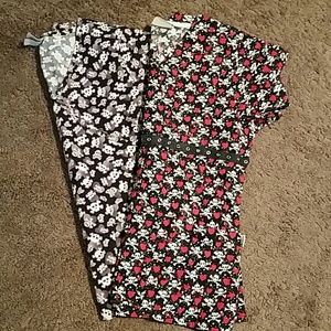 2 skull print scrub tops