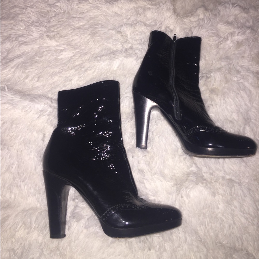 Patient leather boots bought in Italy mid calf.