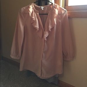 Pale pink ruffled blouse