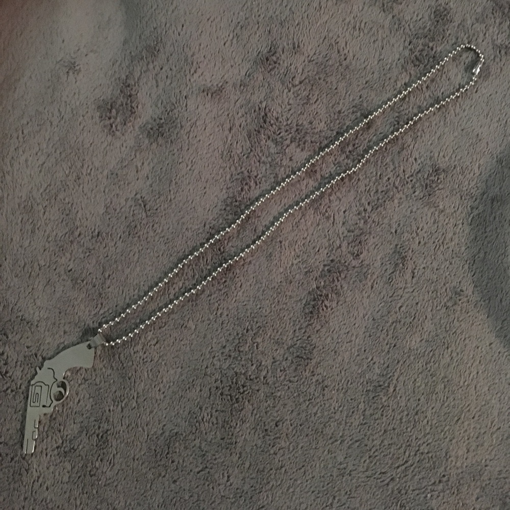 NWOT stainless steel "gun" necklaces