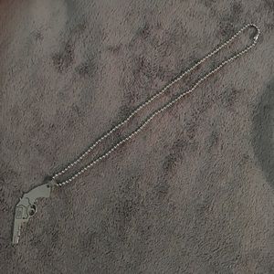NWOT stainless steel "gun" necklaces