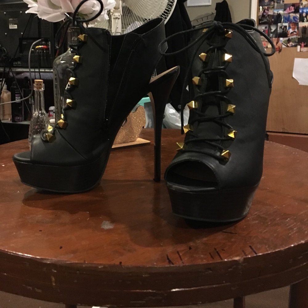 Black high heels with gold studs