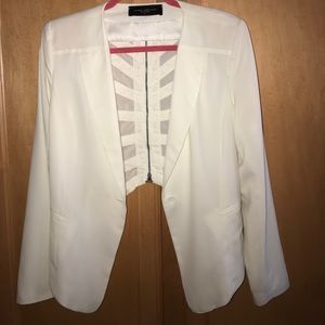 Akira White blazer. Unique style. Zips in back