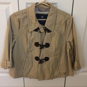 Short brown poncho jacket