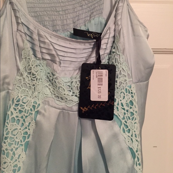 A silk with lace inserts. Adjustable straps - Picture 2 of 3