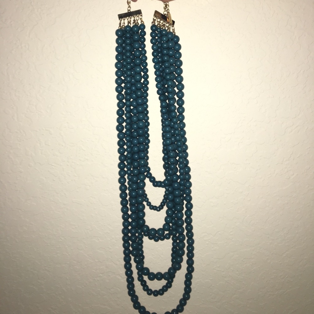 Long blue beaded pearl necklace with gold