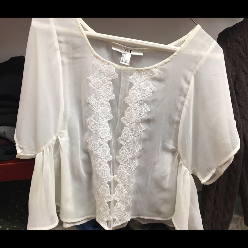 White flowy top
