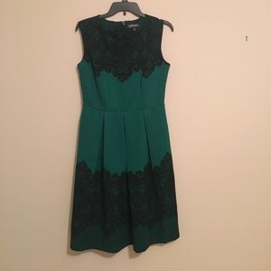 Green dress with black lace print