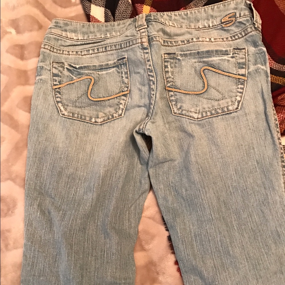 Light wash silver jeans